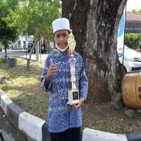 M. Defi Arman Sabet Juara 1 Adzan dan MTQ Tingkat Provinsi