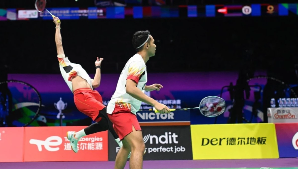 Jadwal & Hasil Drawing Badminton Olimpiade Paris 2024: Kans Merah-Putih Jaga Tradisi Medali - Fajar Alfian dan Rian Ardianto melawan Liang Wei Keng dan Wang Chang pada final Piala Thomas dan Uber 2024. (WANG Zhao / AFP)